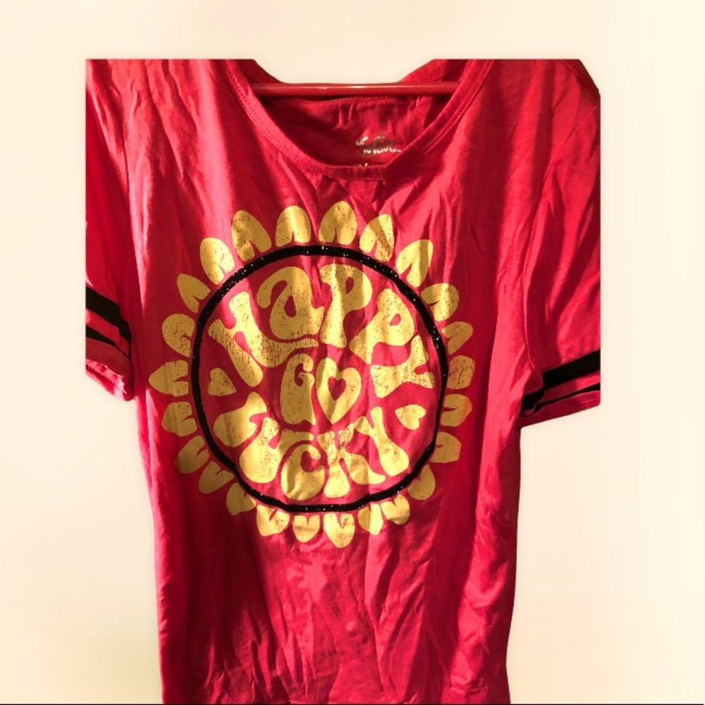 Justice t-shirt.  Never worn. Wrinkles due to storage